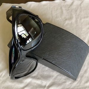 Prada polarized cat eye sunglasses. Made in Italy